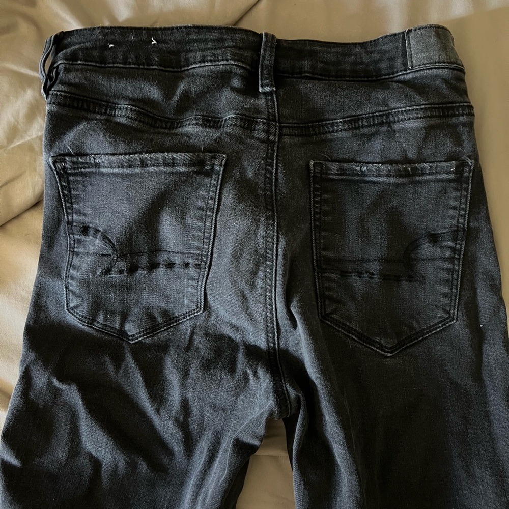 Distressed Black Stretch Skinny Jeans